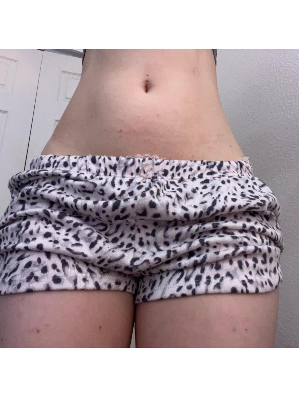 white and black leopard print shorts